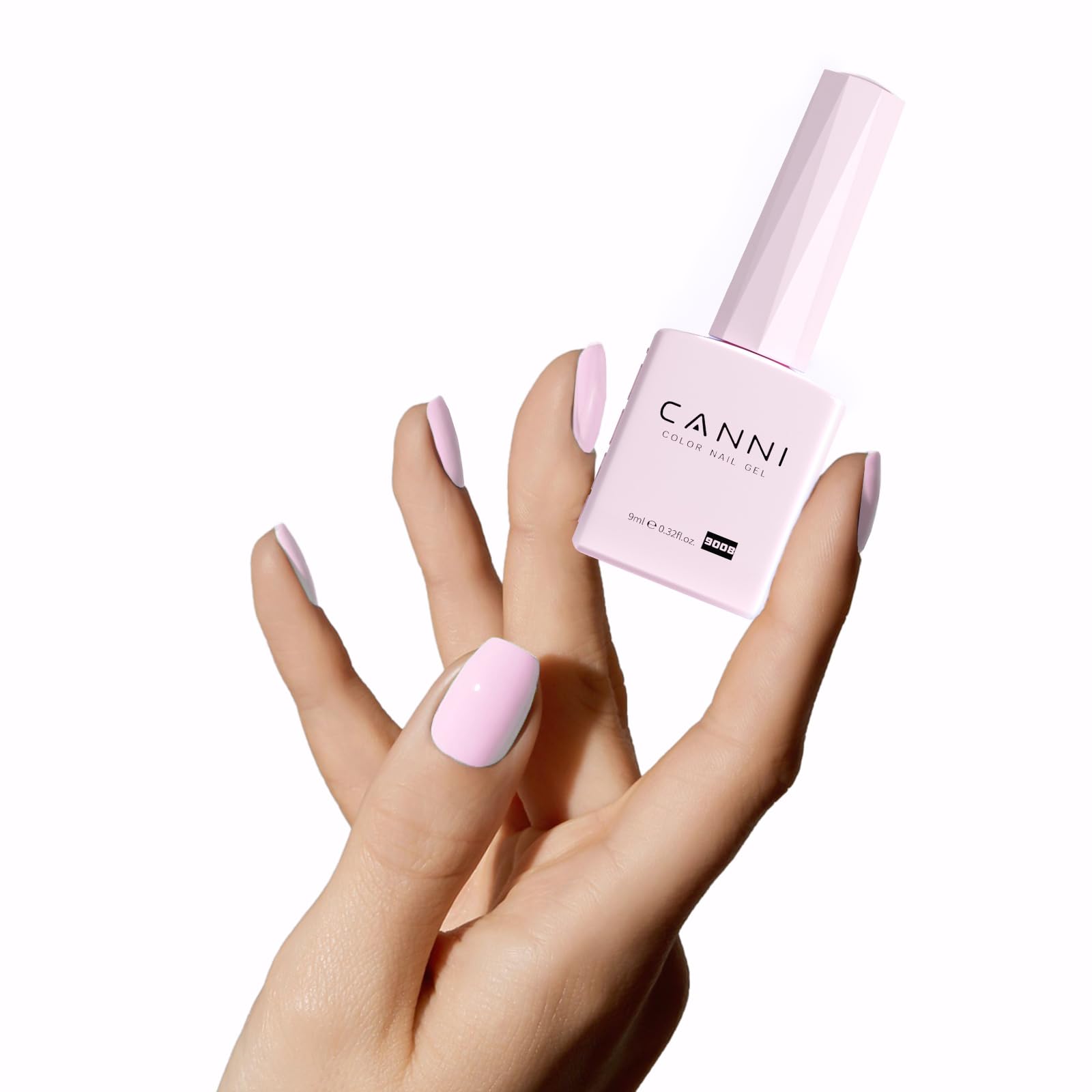 CANNI light pink gel nail polish home manicure scene at home setup.