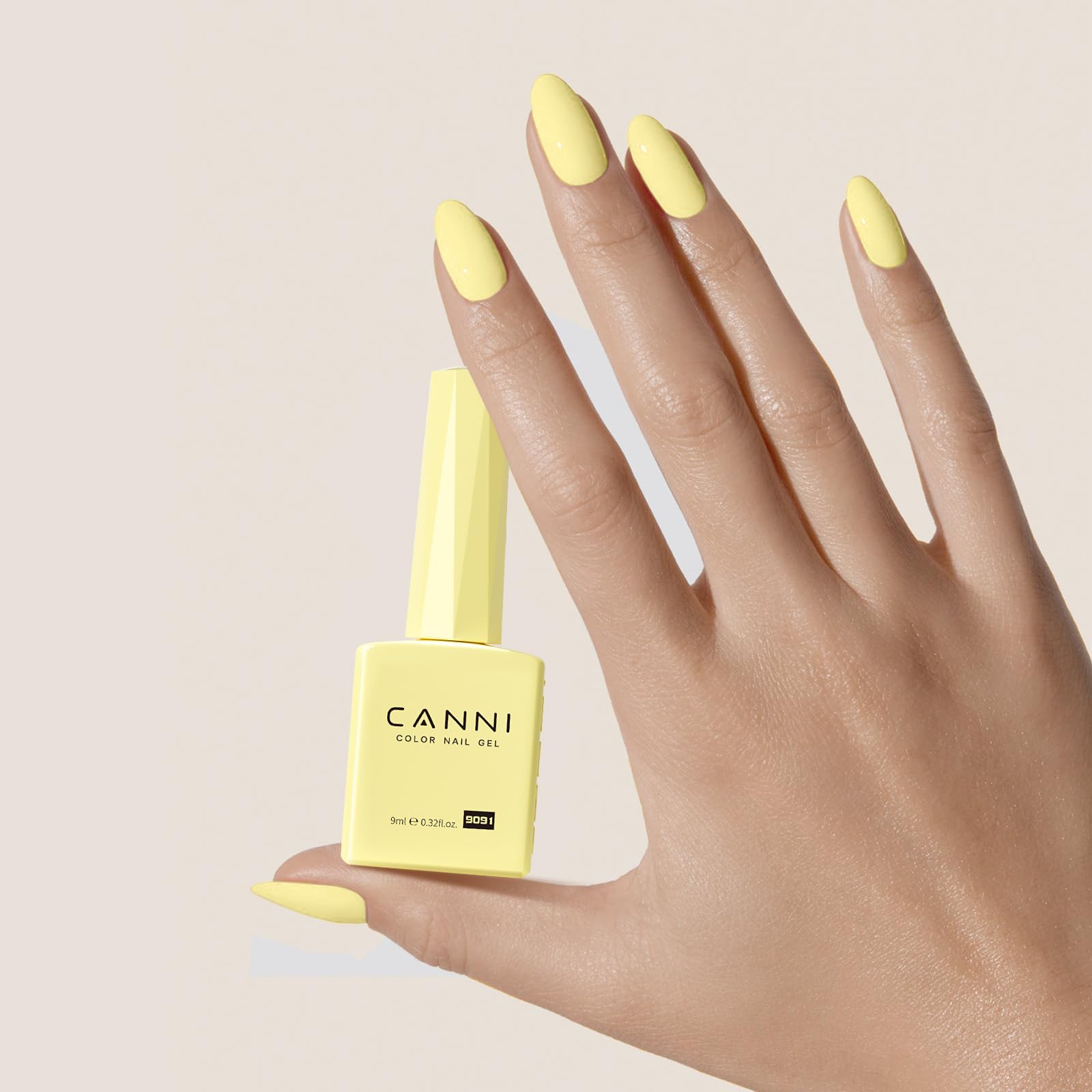 Canni yellow gel nail polish high-gloss finish on nails.