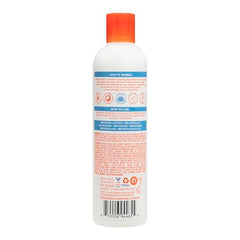 Cantu Weightless Smooth Curl Cream on hair demonstrates frizz-free, bouncy curls with lasting moisture