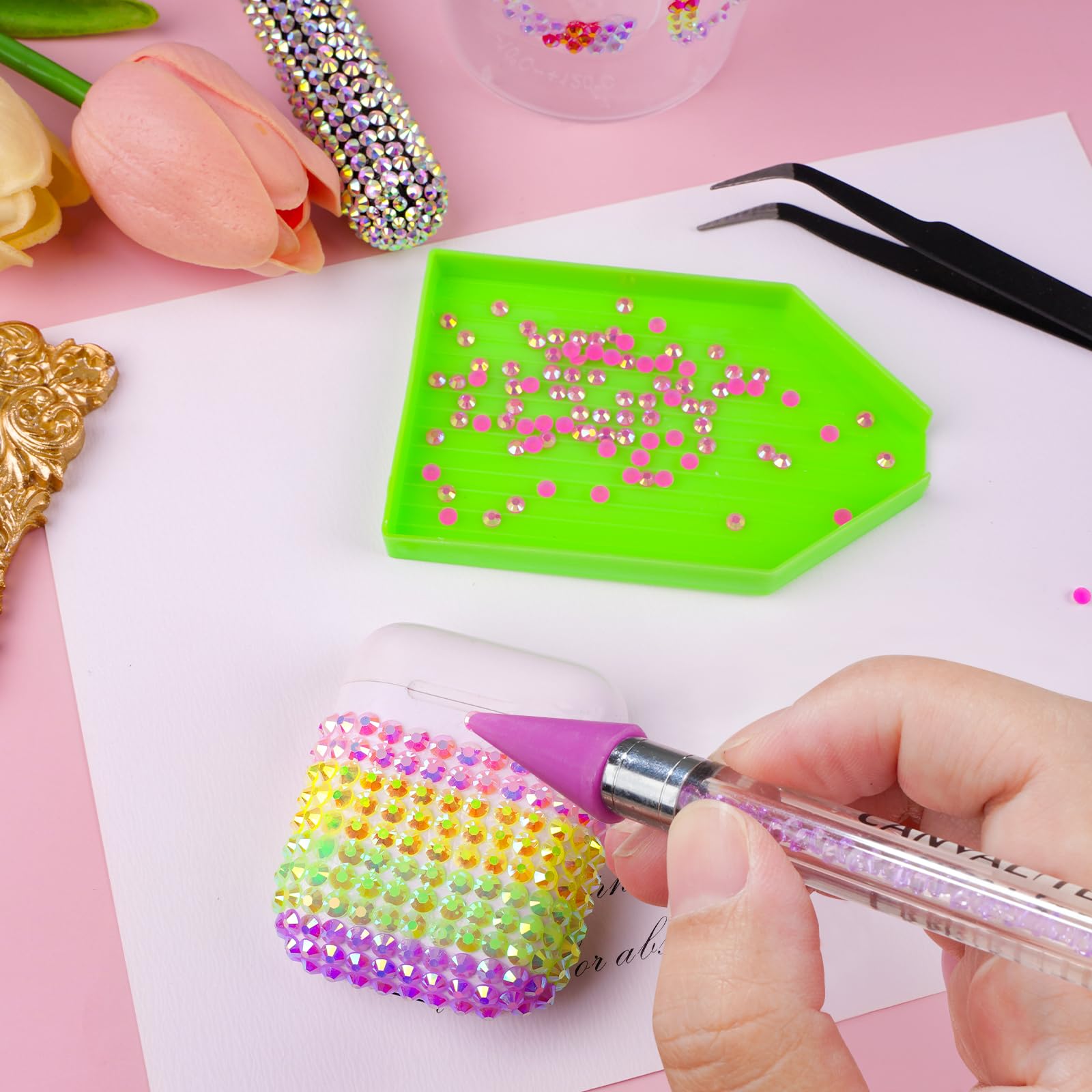 CANVALITE gems in nail art designs for sparkling manicures.