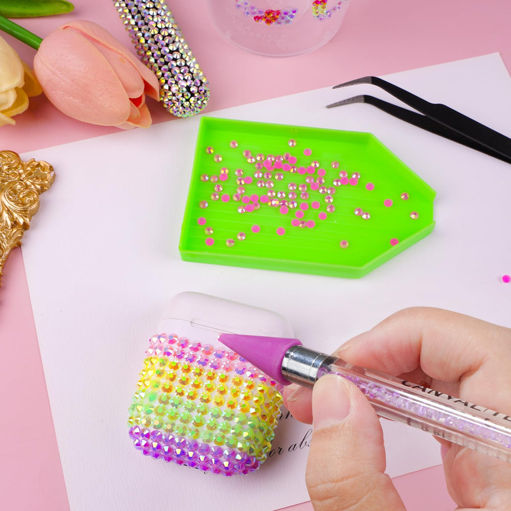 CANVALITE gems in nail art designs for sparkling manicures.