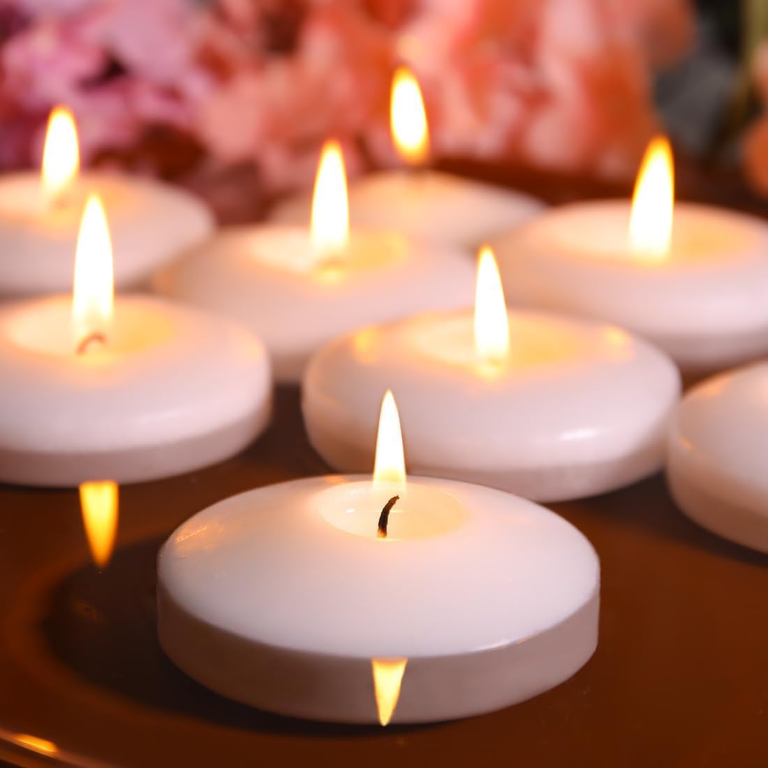 Capaniel white floating candles on water centerpiece for elegant events.