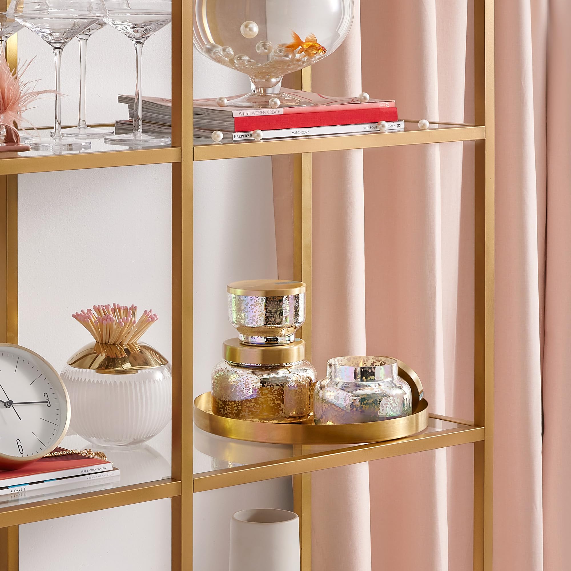 Capri Blue Iridescent Jar on Shelf offers luxe decor element for living spaces.