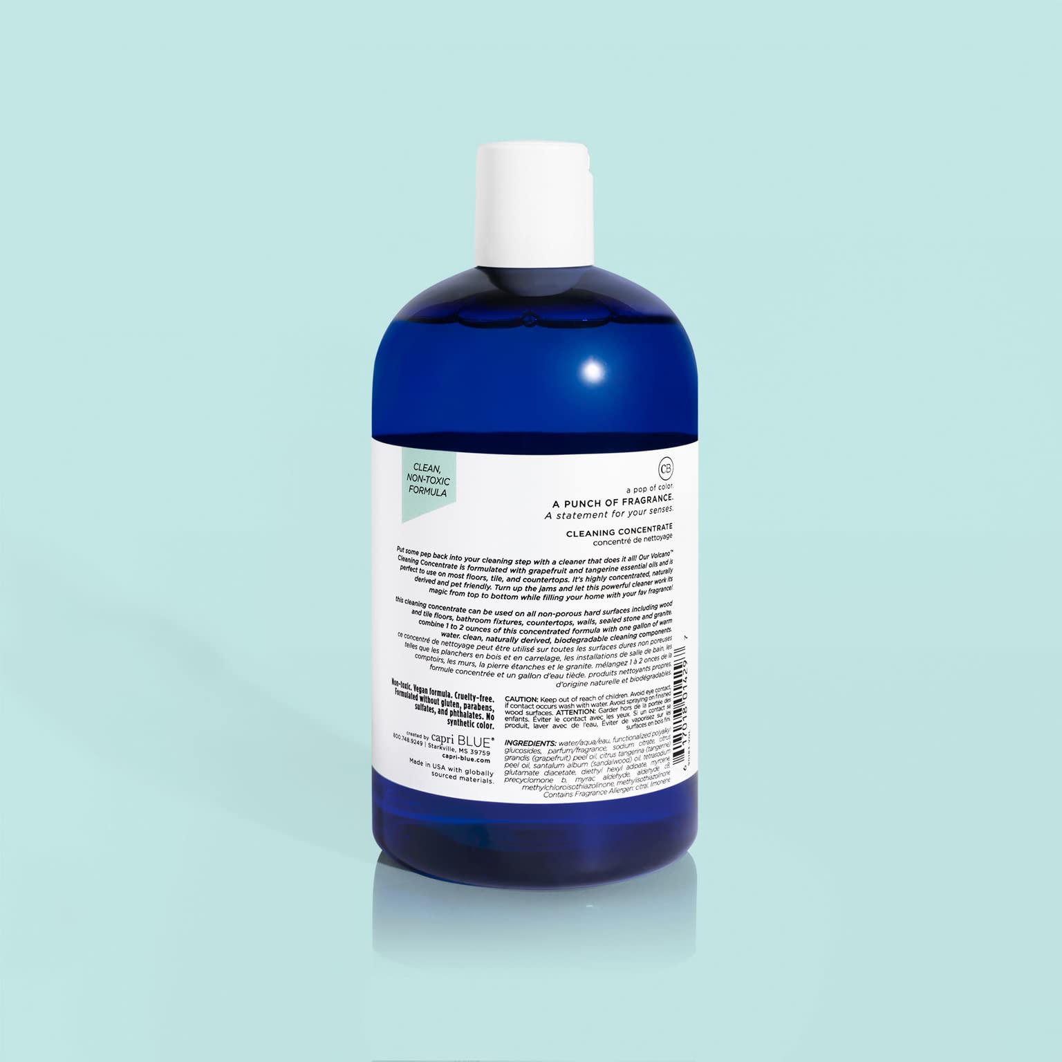 Capri Blue Volcano cleaner packaging graphic highlights eco-friendly and vegan claims.