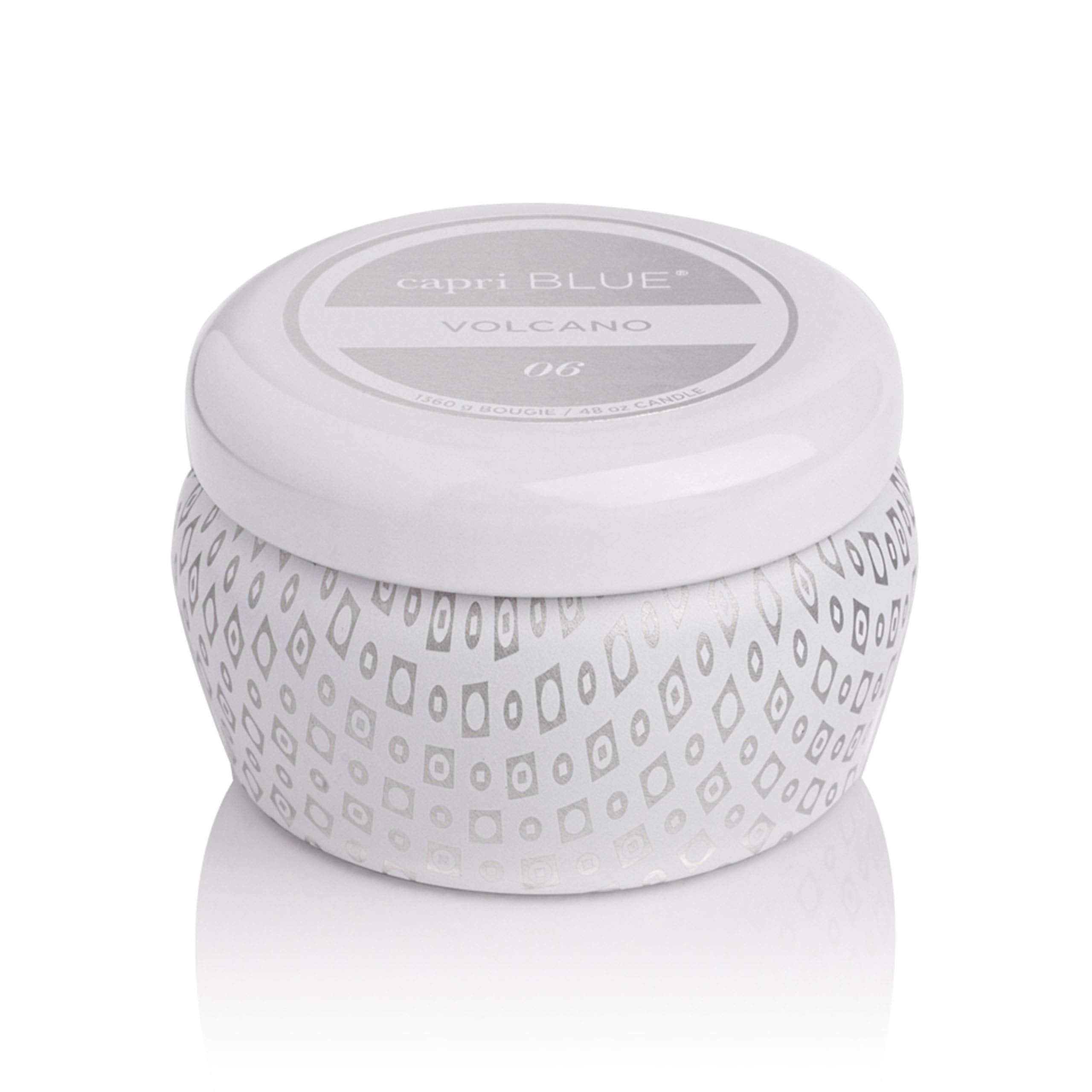 Capri Blue Volcano White mini tin candle on the go for portable ambiance.