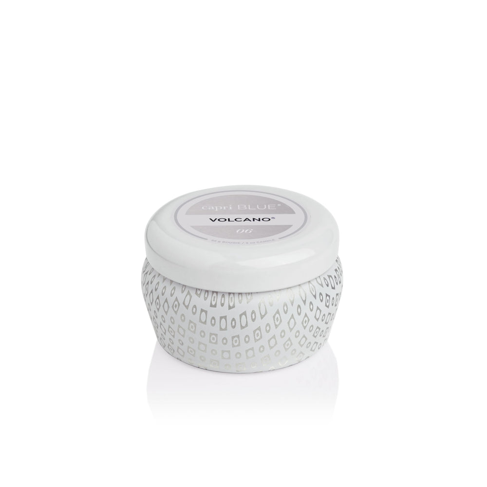 Capri Blue Volcano White mini tin candle with pour, travel-friendly fragrance option.