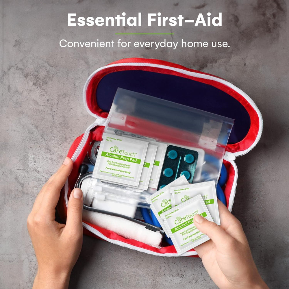 Care Touch 100-pack home-first-aid-kit pads illustrate compact size for quick on-site cleanup.