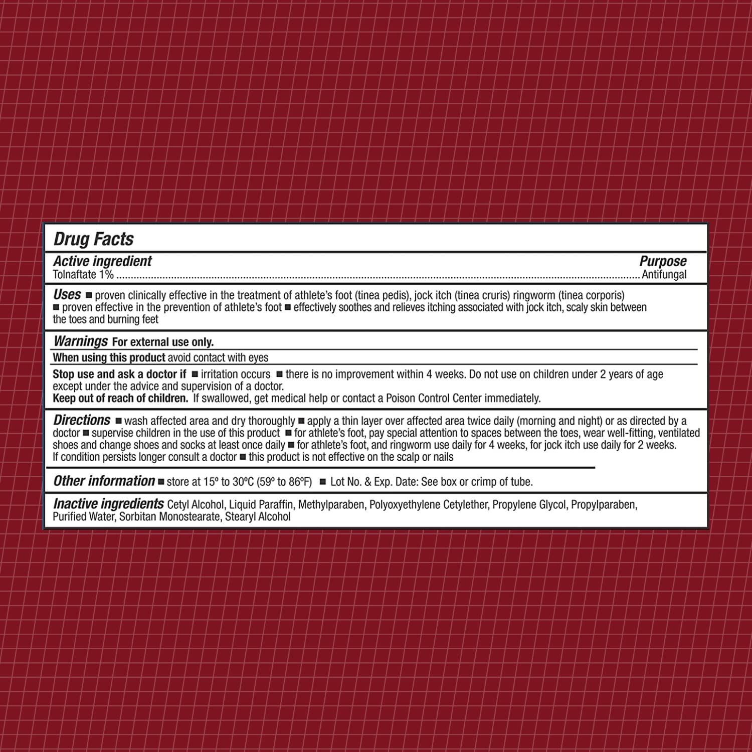Close-up of Tolnaftate label highlighting 1% active ingredient and branding.
