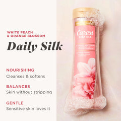 Caress Daily Silk foam-closeup highlights rich lather and gentle cleanse.