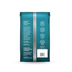 Caribou Coffee ground coffee bag closeup highlights smooth medium roast aroma for brewing.
