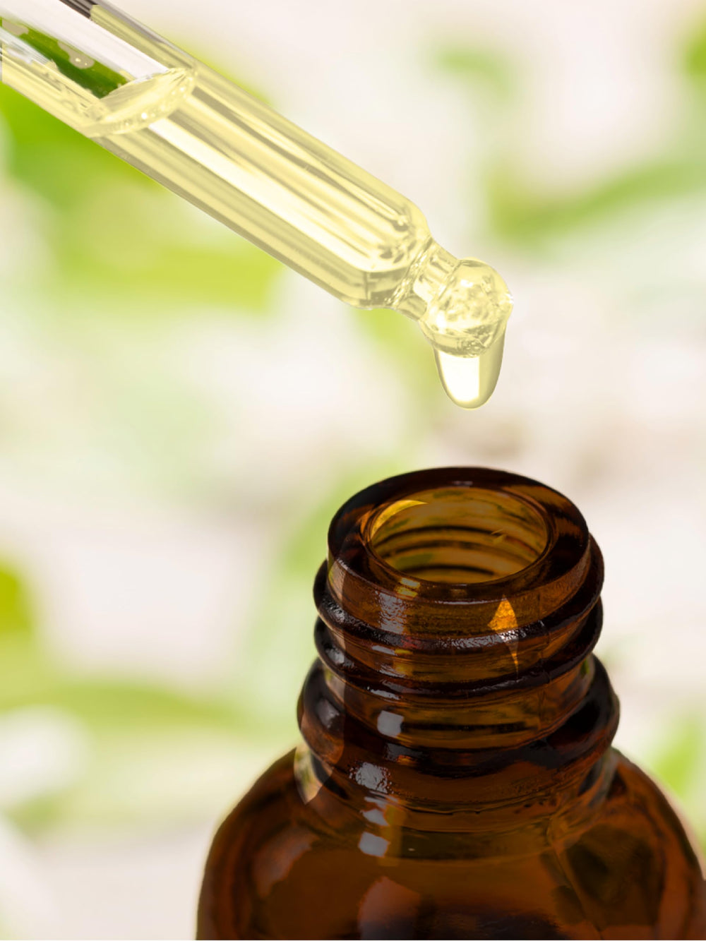 Daily-use biotin drops sit on a bathroom shelf