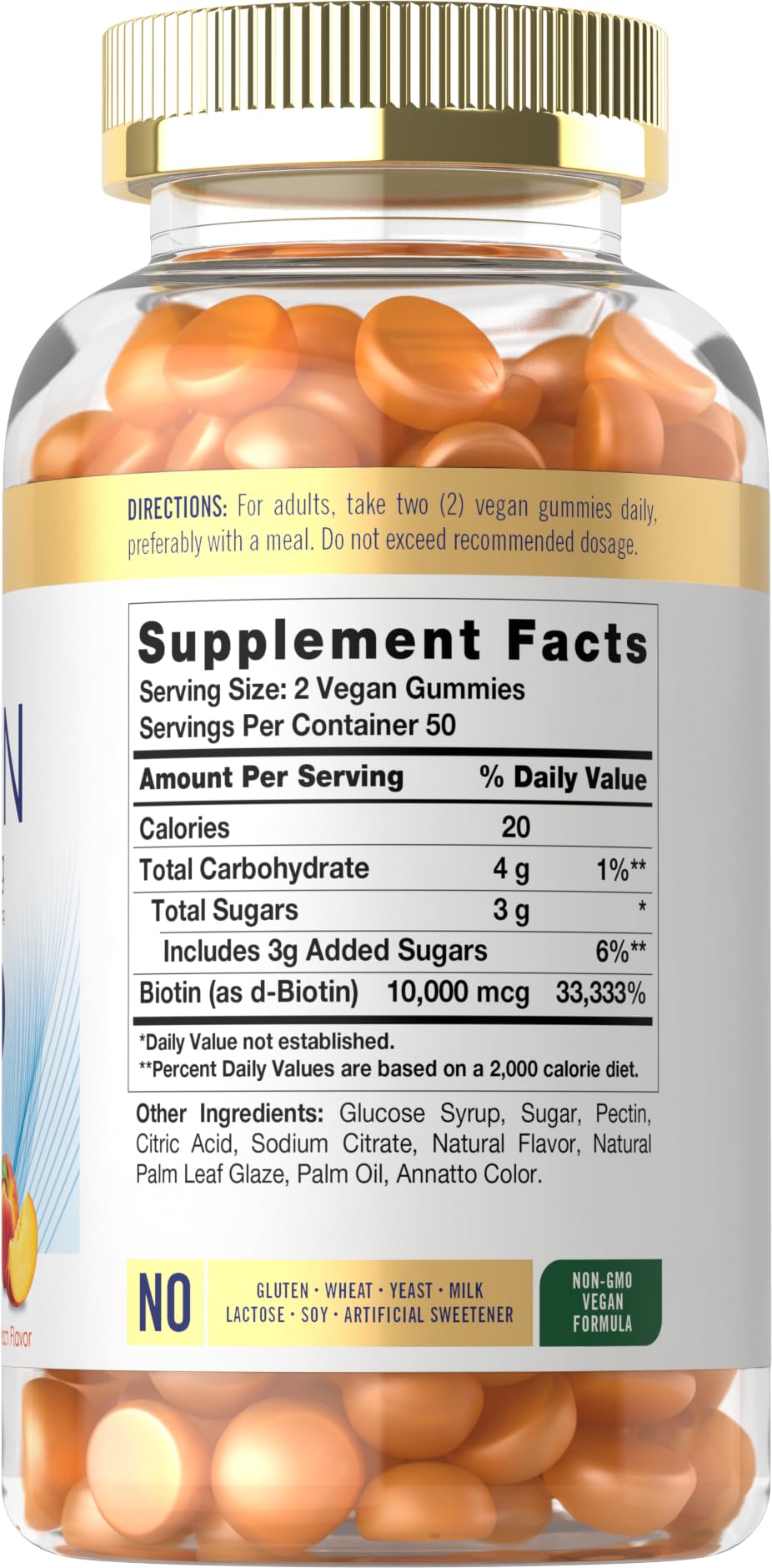 Closeup of peach flavored gummies showing high-potency biotin.
