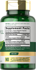 Carlyle Chlorophyll Pills capsules closeup showing green tablets, non-GMO formula.