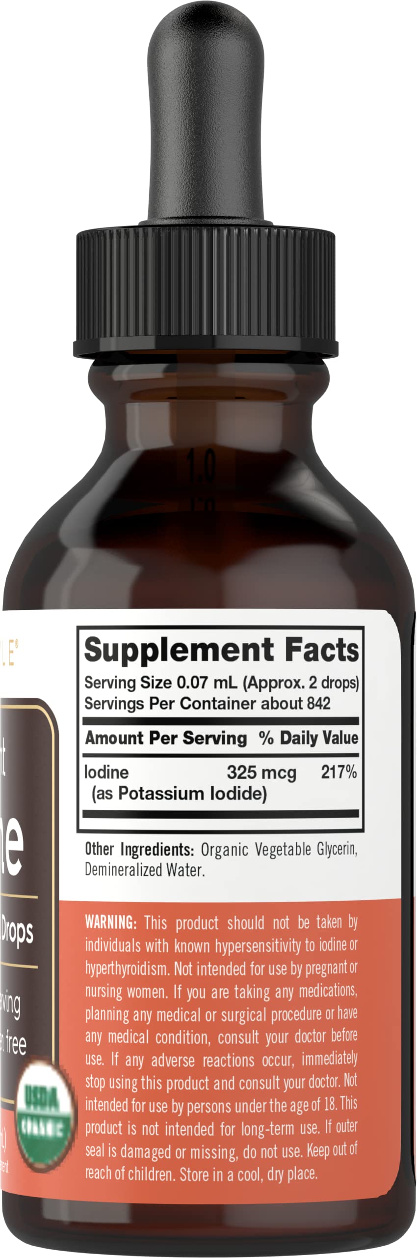 Carlyle Nascent Iodine drops pouring from a dropper for precise dosing.