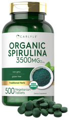 Carlyle Organic Spirulina tablets in bottle for daily wellness.