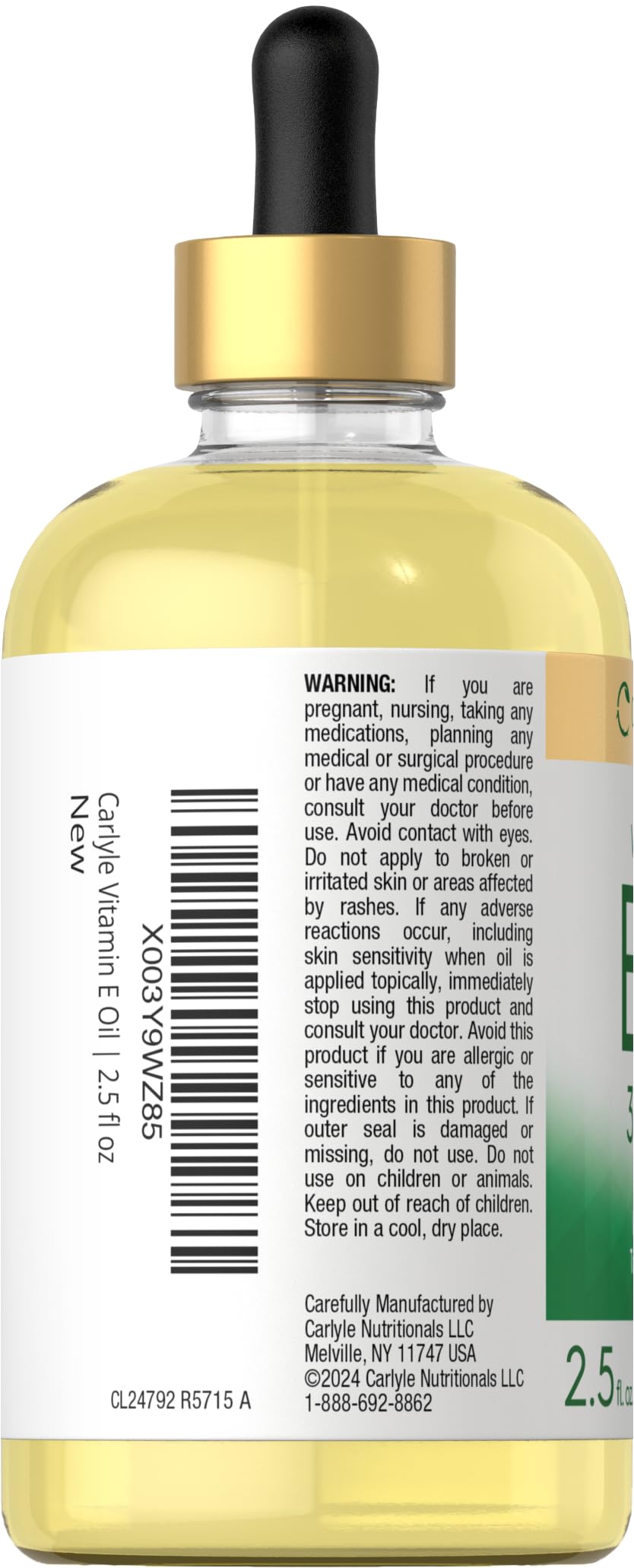 Carlyle Vitamin E Oil dropper ready for precise topical application and hydration.