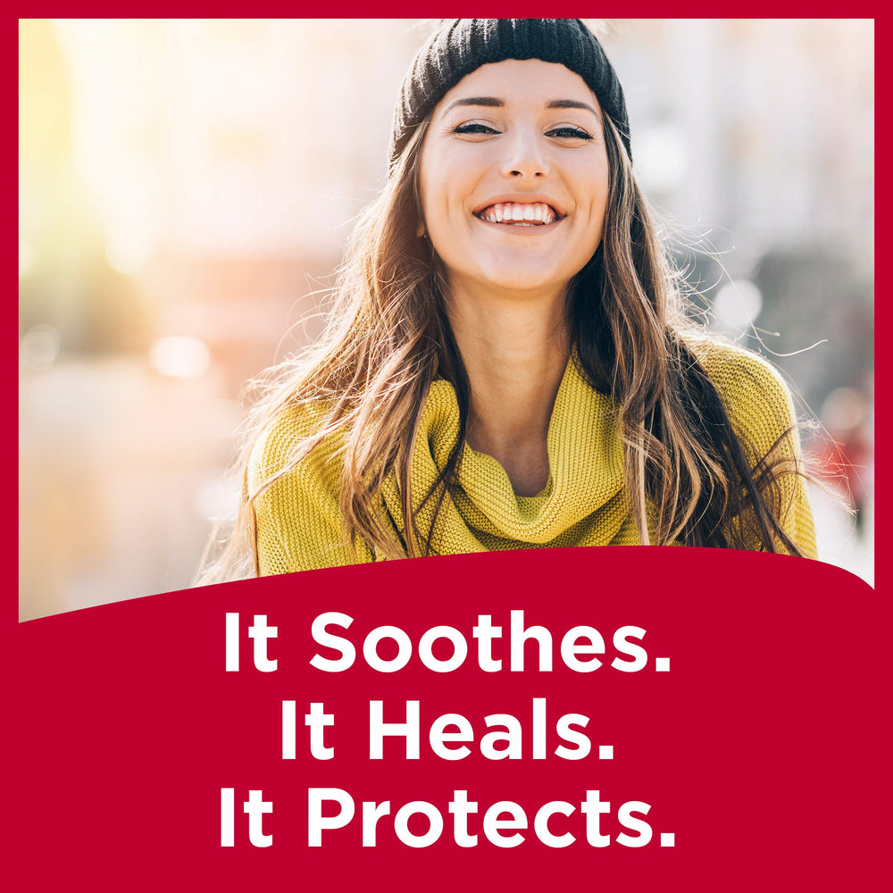 Close-up of Carmex on lips showcasing smooth glide and hydration.