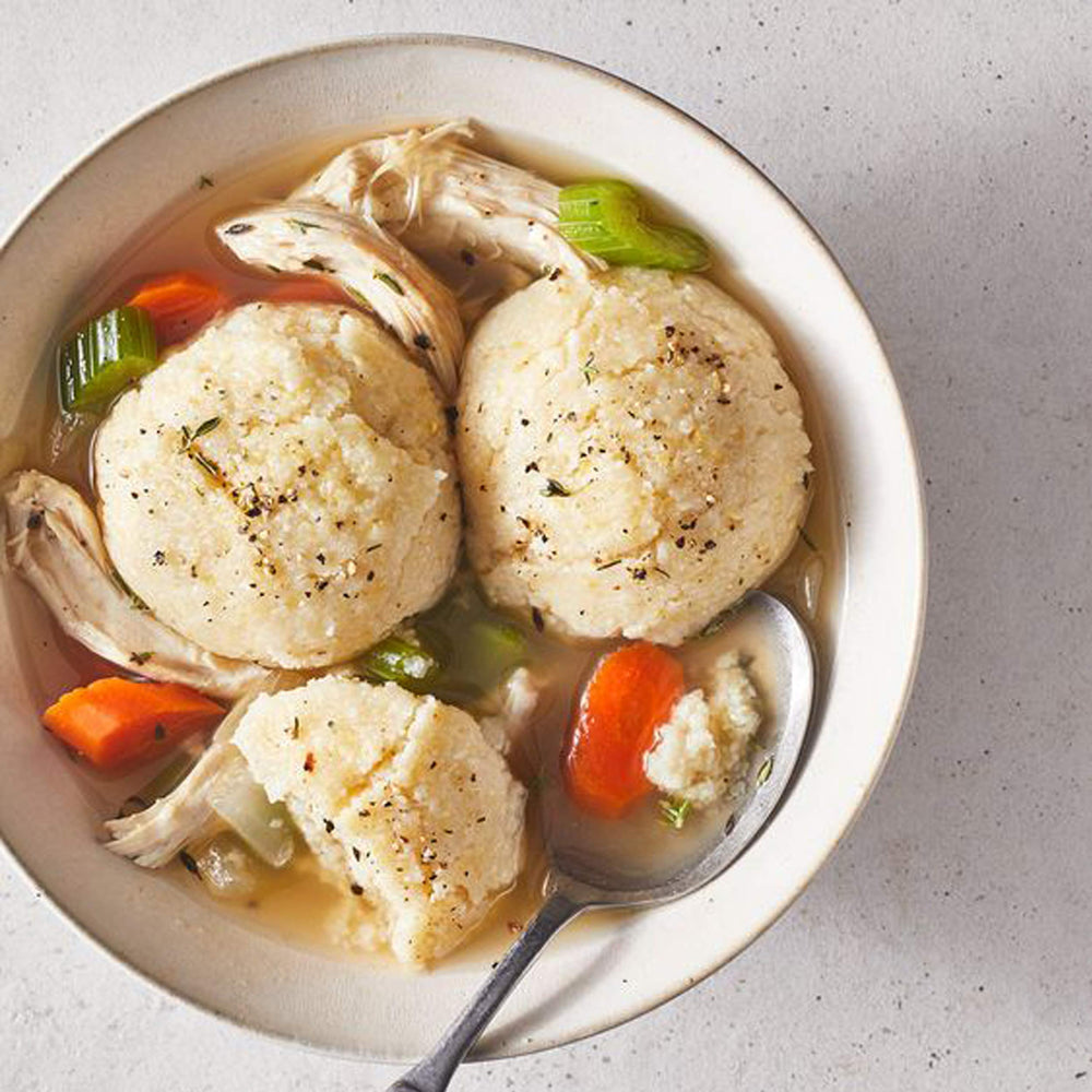 Shrimp Carolina-style served with Carolina Grits as a savory base.