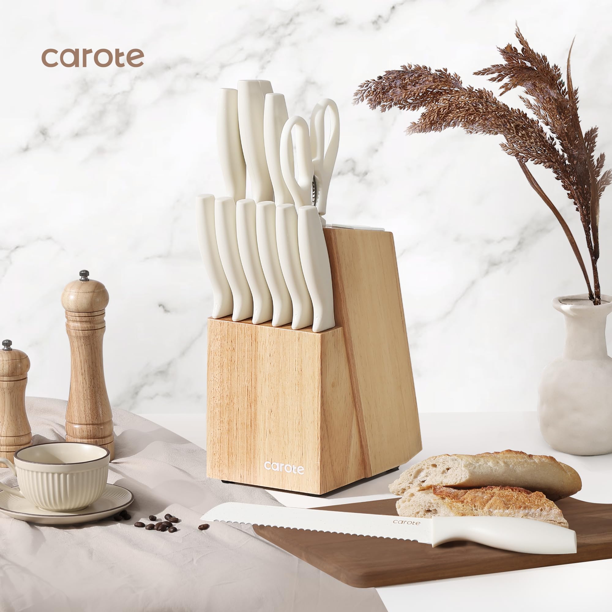 CAROTE chef knife with white ceramic-coated blade delivers clean cuts.