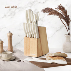CAROTE chef knife with white ceramic-coated blade delivers clean cuts.