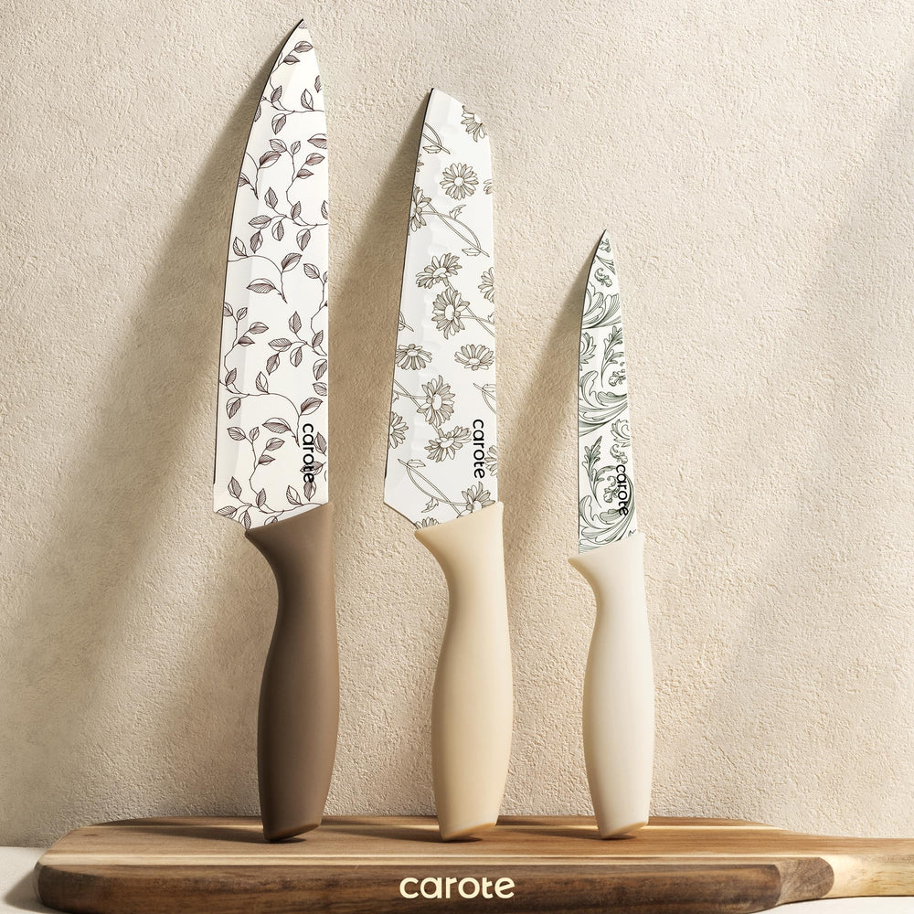 CAROTE delicate floral designs adorn the set for a decorative kitchen touch.
