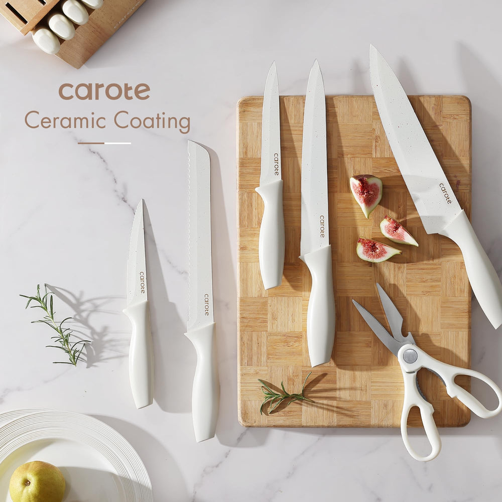 CAROTE santoku knife features white ceramic-coated blade for versatile prep.