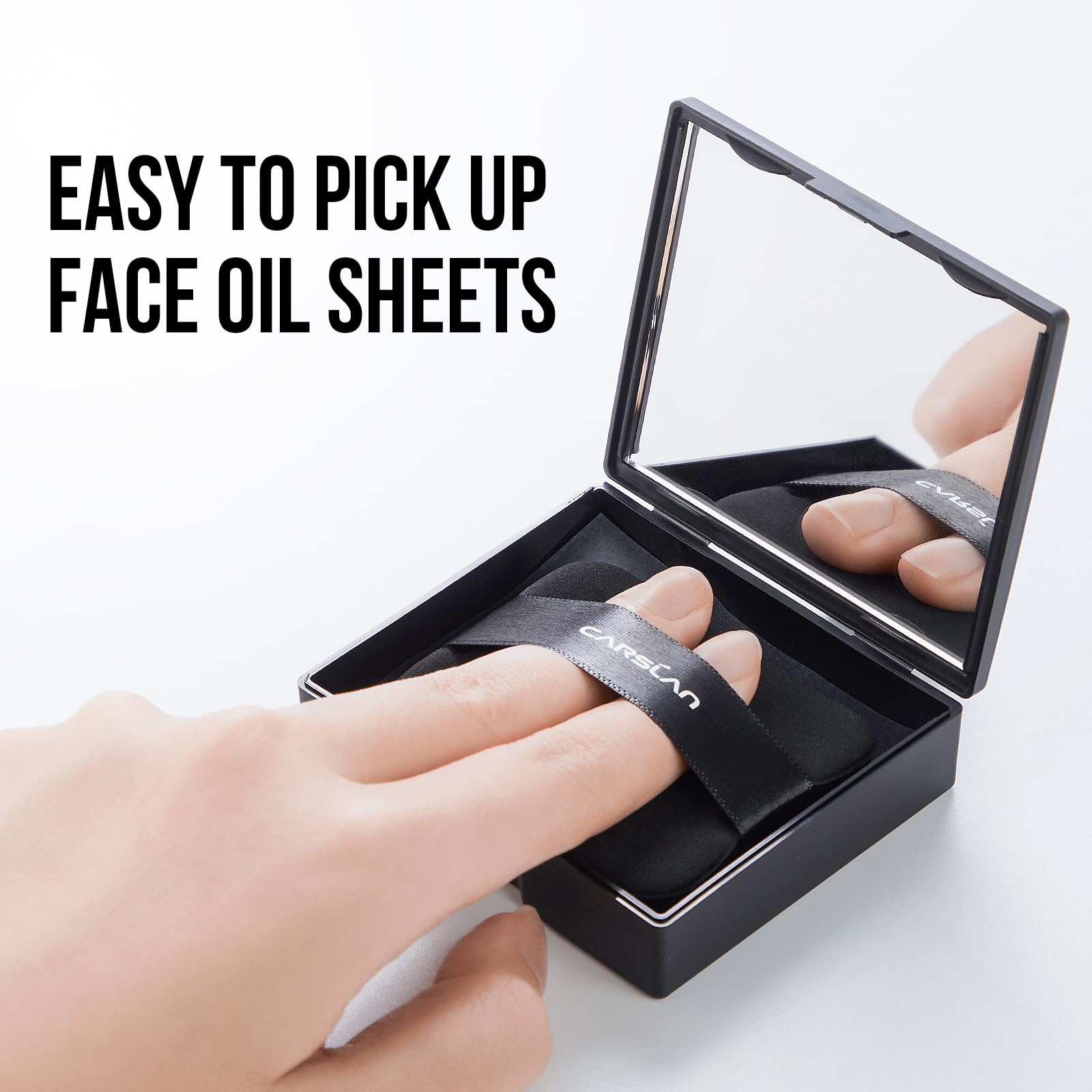 CARSLAN blotting papers with a soft puff for gentle touch-ups.