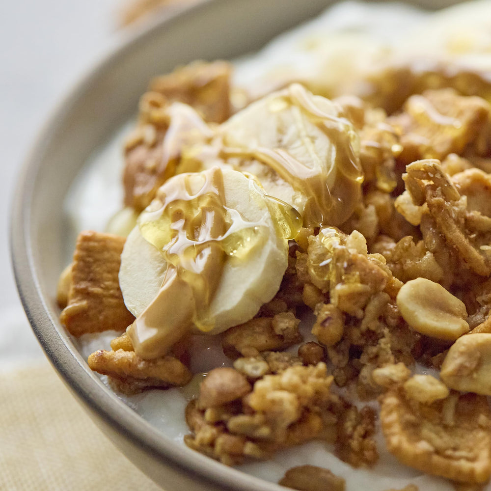 Catalina Crunch peanut butter granola atop yogurt for a protein boost