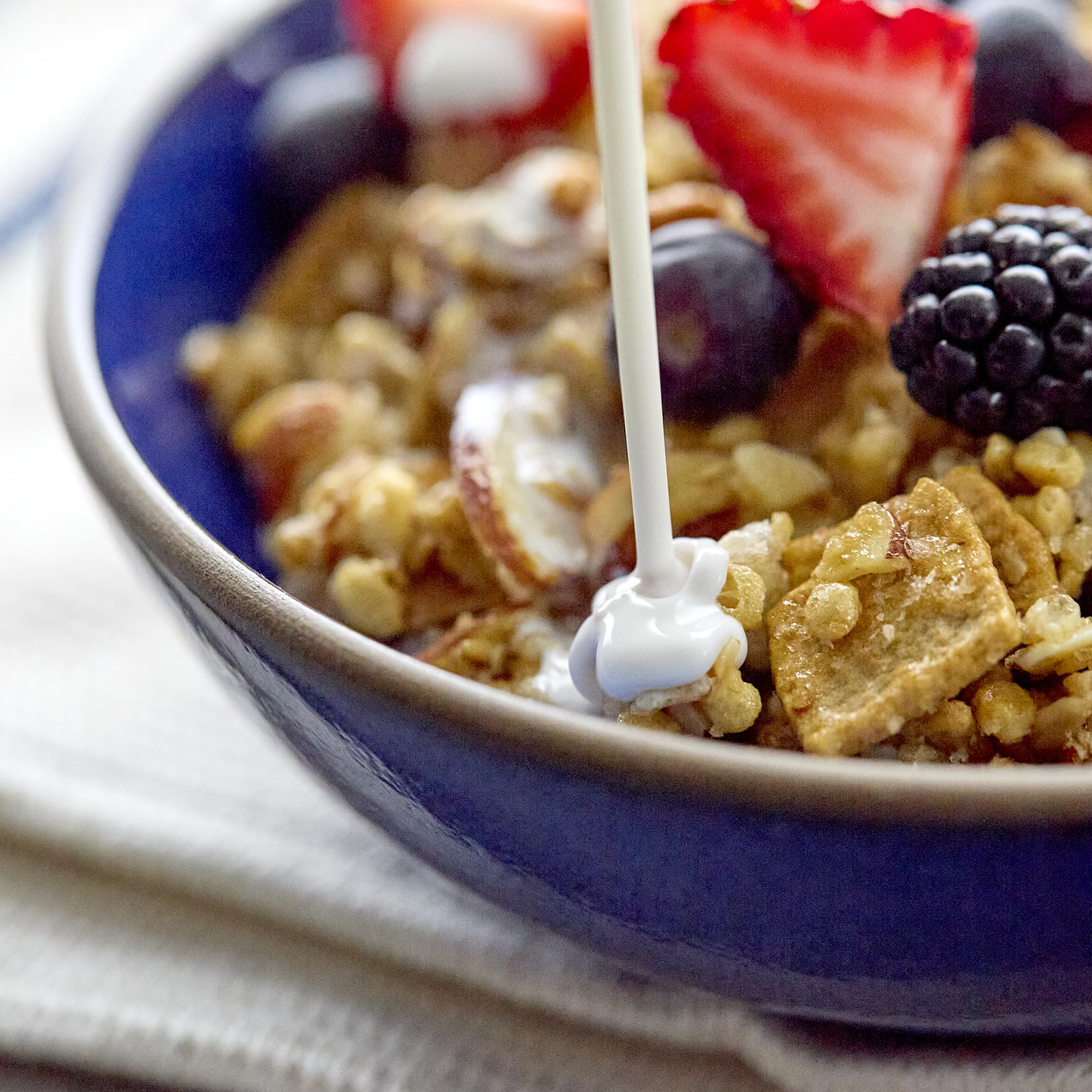 Ingredients include almonds and gluten-free oats used in Catalina Crunch granola.