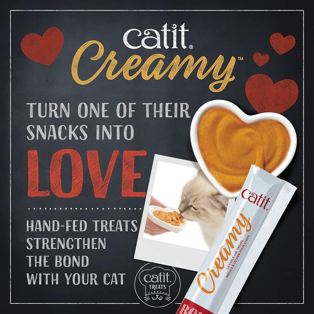 Catit Creamy Treat served in a dish, versatile meal topper