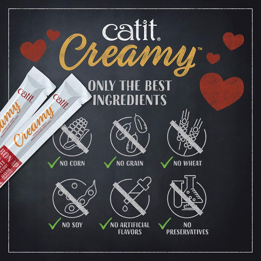 Catit Creamy Treat hand-fed during a bonding snack