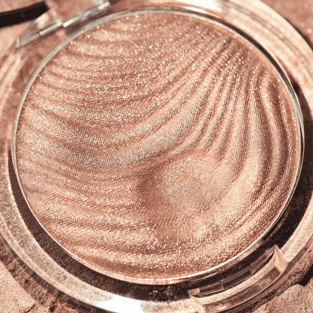 Catrice Aura Glam Bouncy Highlighter brow bone highlight for subtle lift.