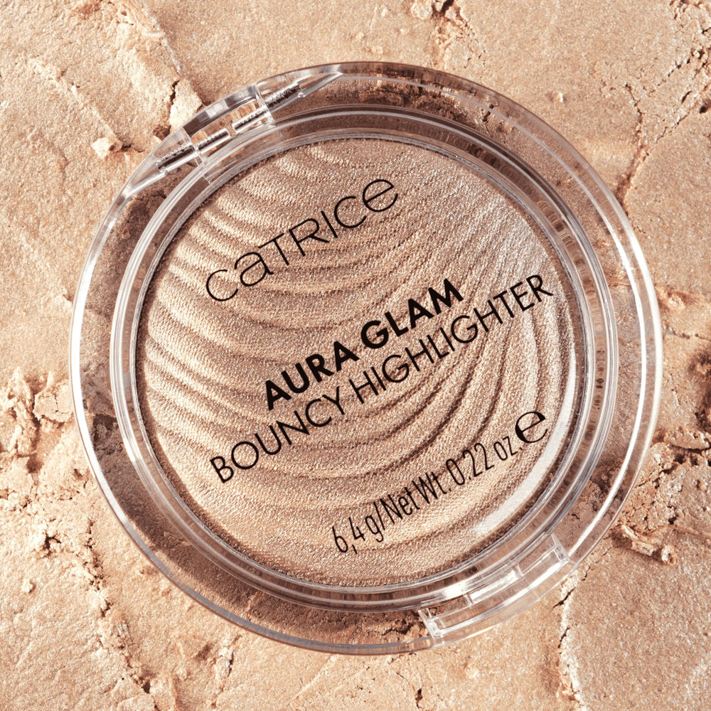 Catrice Aura Glam Bouncy Highlighter lips glow with radiant cream-to-powder finish.
