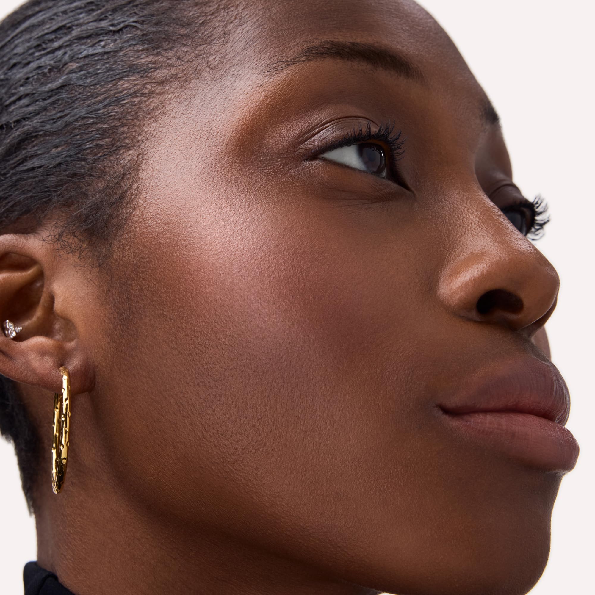 Cheekbone definition with Catrice Soft Glam Baked Blush applied precisely.