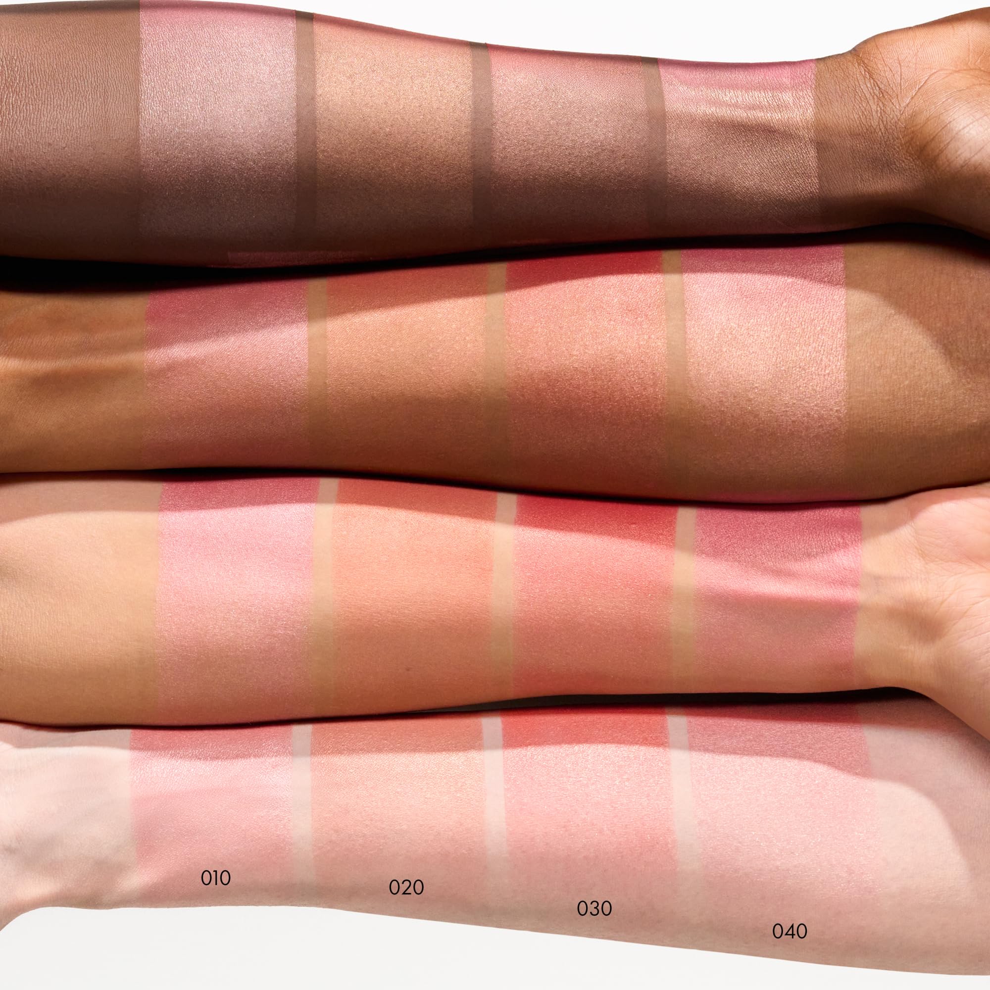 Catrice Soft Glam Baked Blush Midnight Berry swatches display buildable color on cheek.