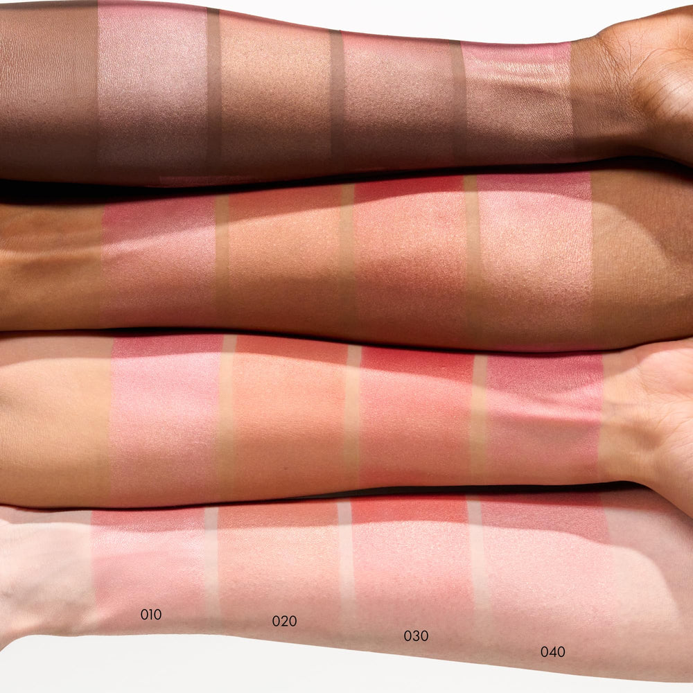 Catrice Soft Glam Baked Blush Midnight Berry swatches display buildable color on cheek.