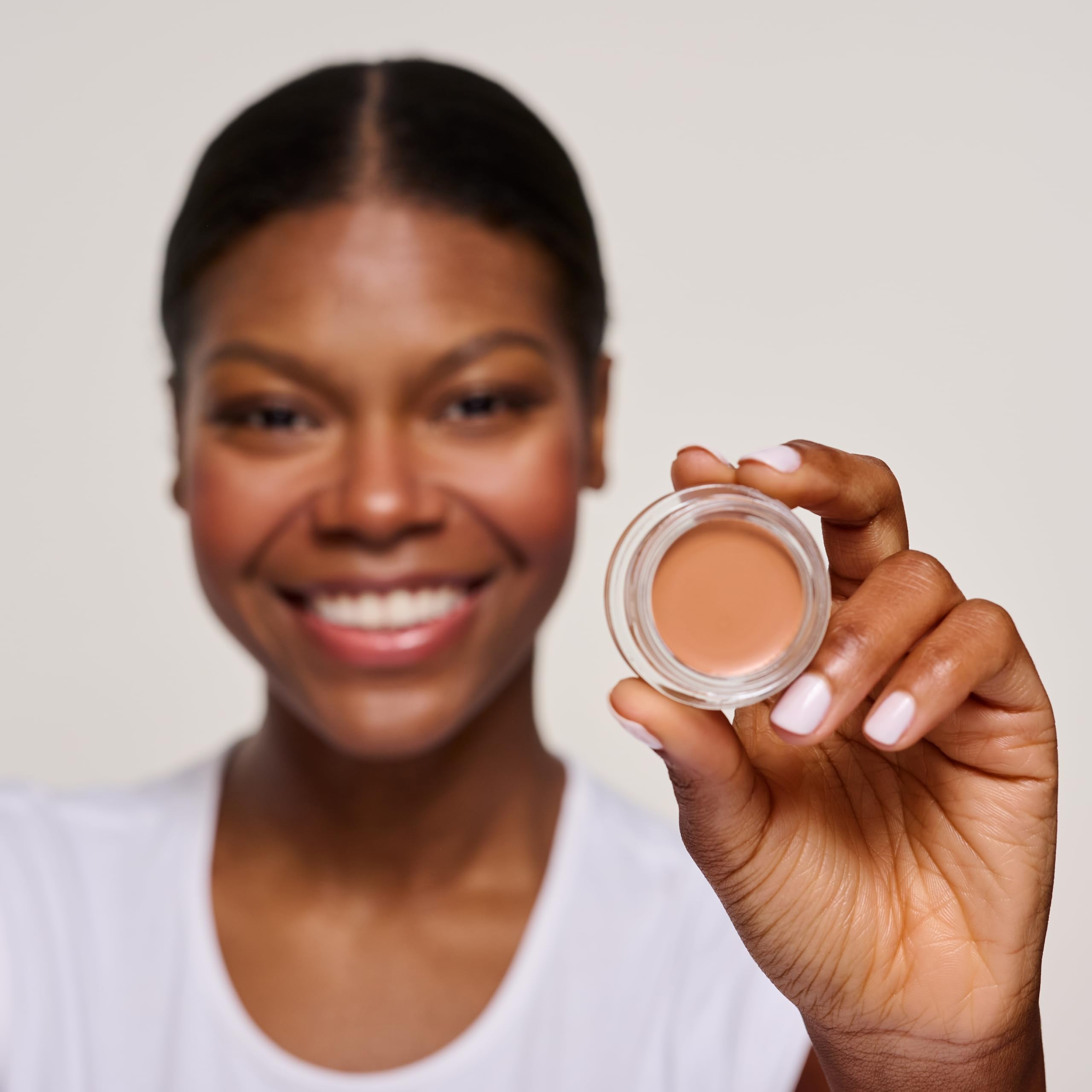 Catrice Under Eye Brightener shea butter close-up signals conditioning moisture.