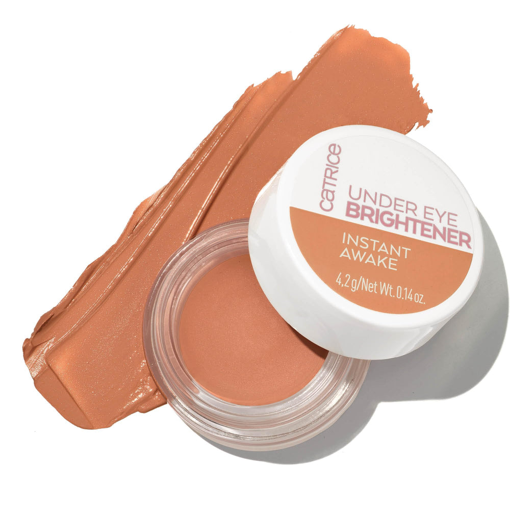 Catrice Under Eye Brightener swatch reveals warm tone balancing bluish shadows.