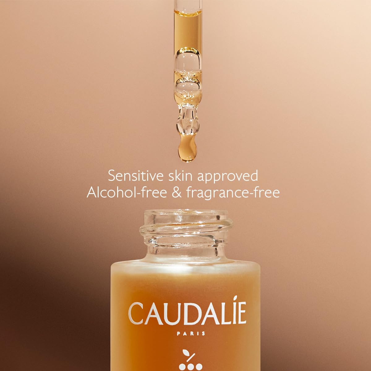 Caudalie Self-Tan Sun Drops applied to the face for even tone.