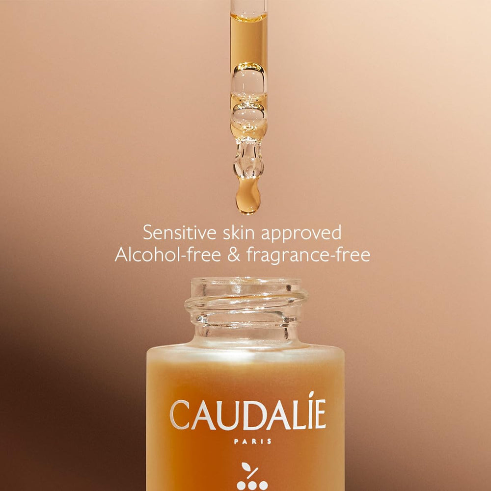 Caudalie Self-Tan Sun Drops applied to the face for even tone.