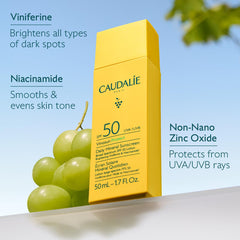 Caudalie Vinosun Protect sunscreen on hand for easy daily application.