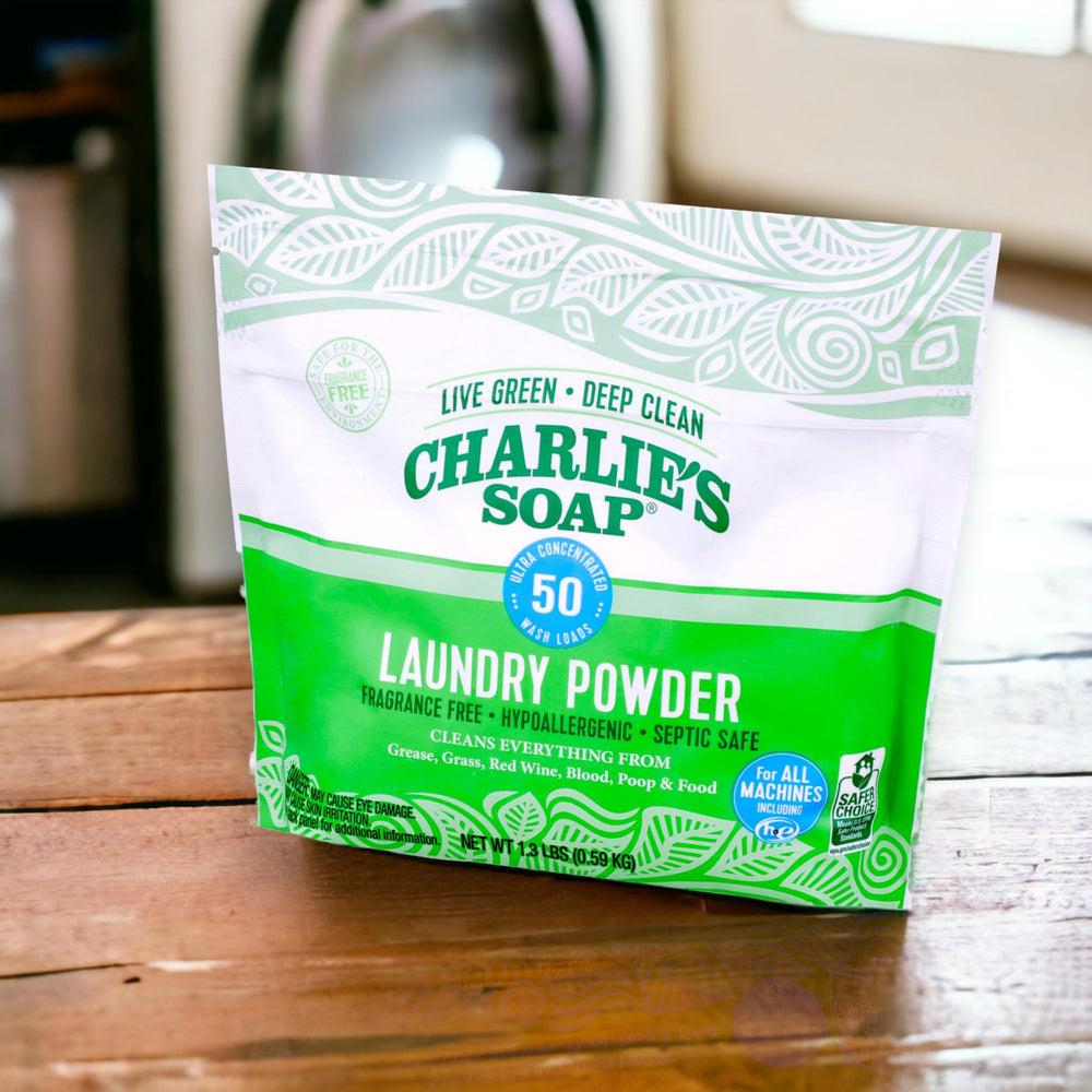 Charlie's Soap per-load dosing shot demonstrates measuring one tablespoon for strong wash.