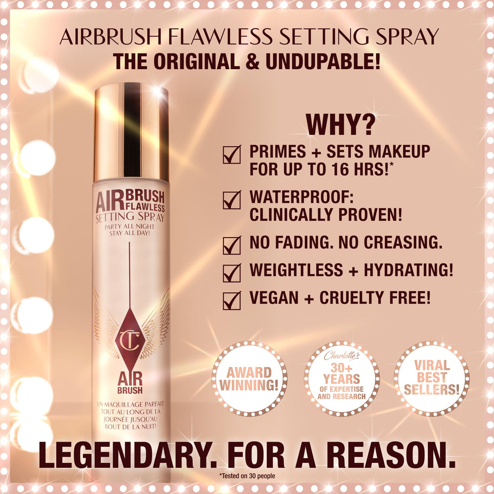 Charlotte Tilbury Airbrush Flawless Setting Spray mist captured mid-air for even application.