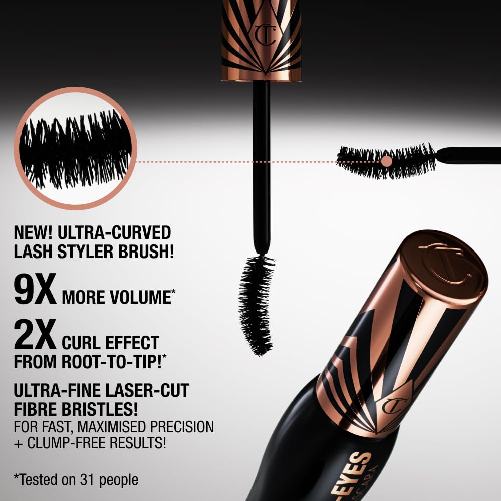 Charlotte Tilbury Exagger-Eyes ultra-curved lash brush in a glass bottle setting.