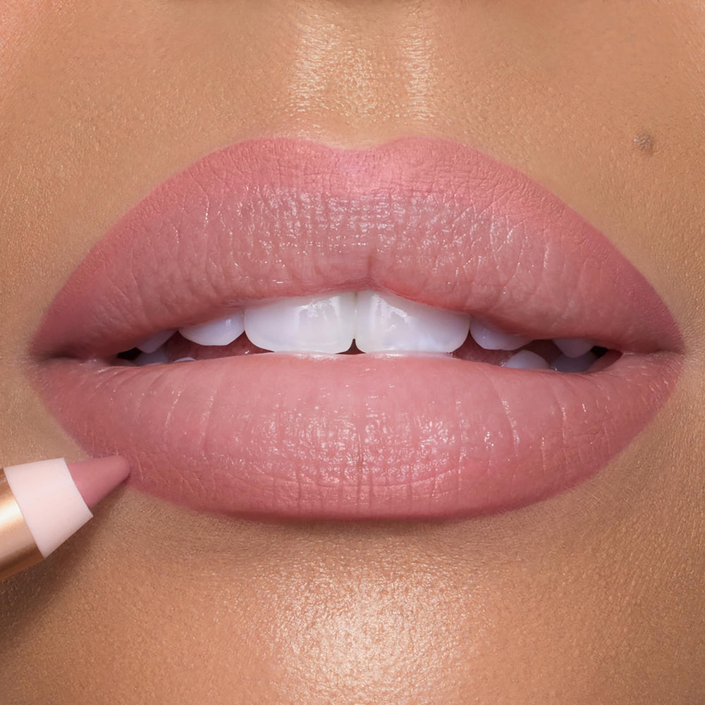 Charlotte Tilbury Lip Cheat jojoba oil moisturizes lips for a comfortable glide.
