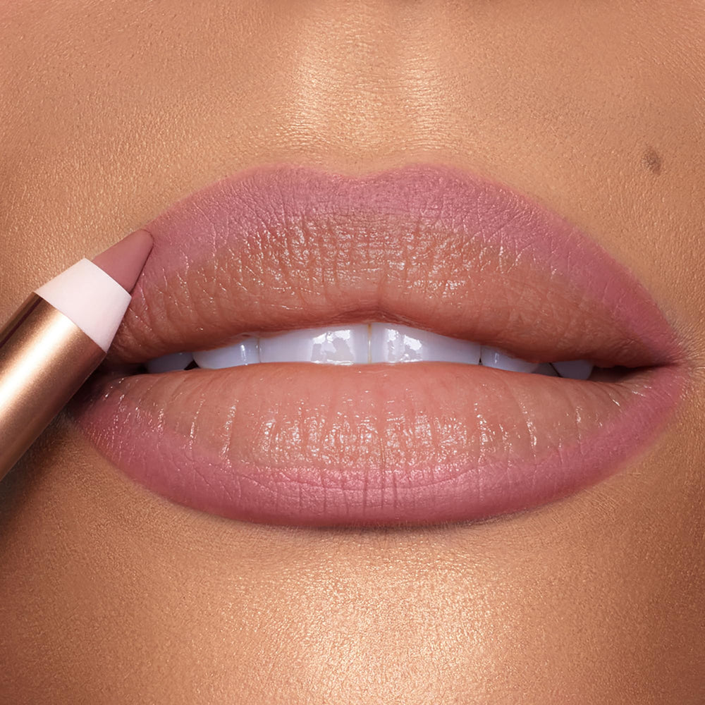 Charlotte Tilbury Lip Cheat waterproof close-up emphasizes smudge-proof, long-wear performance.