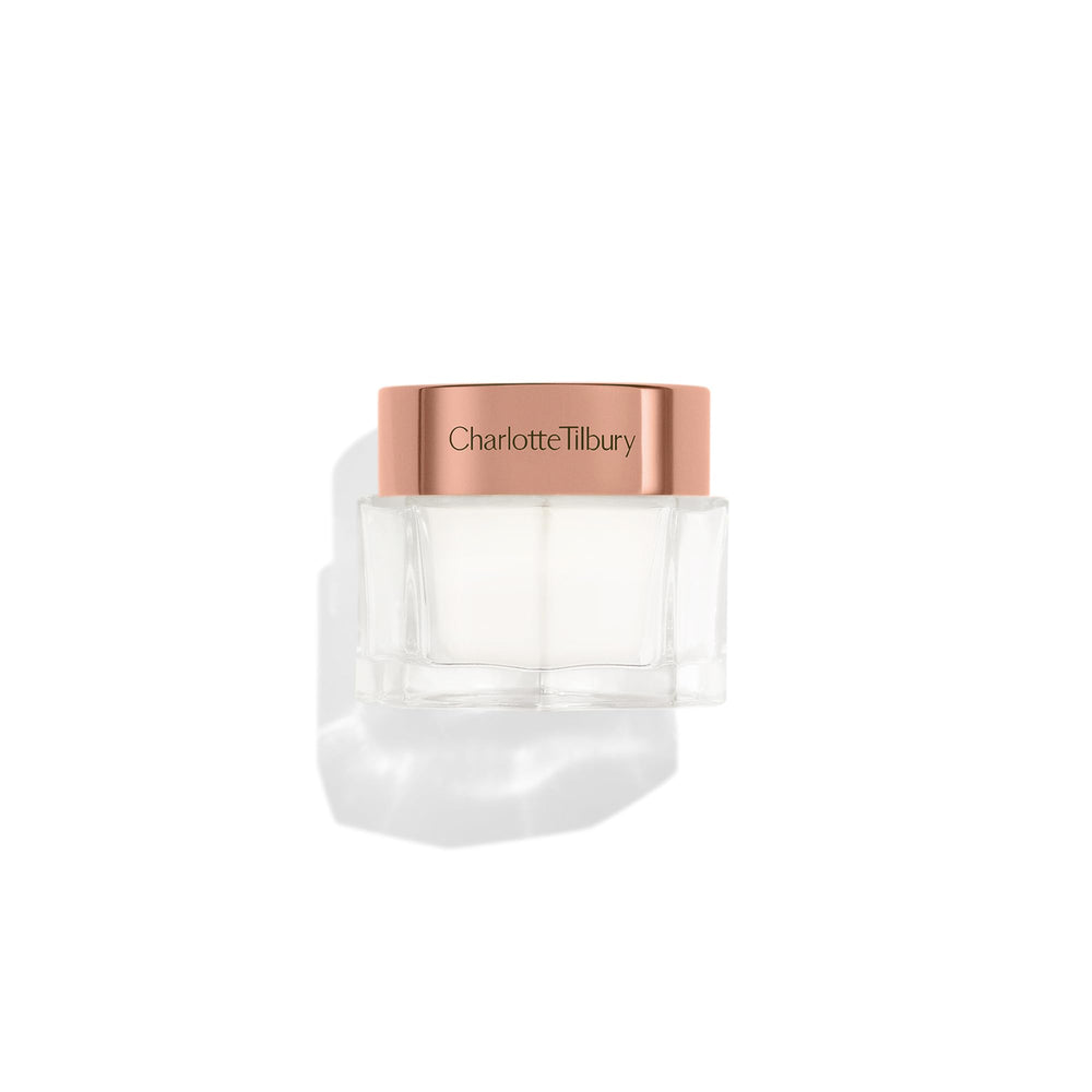 Charlotte Tilbury Magic Cream jar closeup shows hydrating formula for a radiant glow.