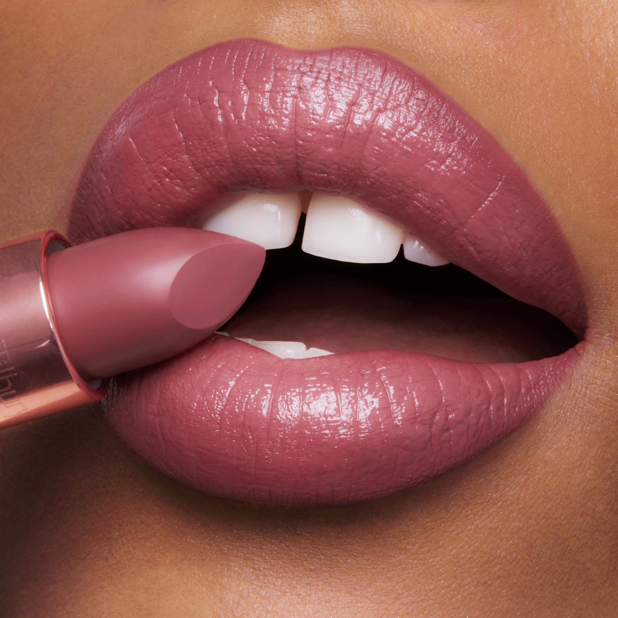 Charlotte Tilbury Matte Revolution mini red lip bullet close-up for precision.