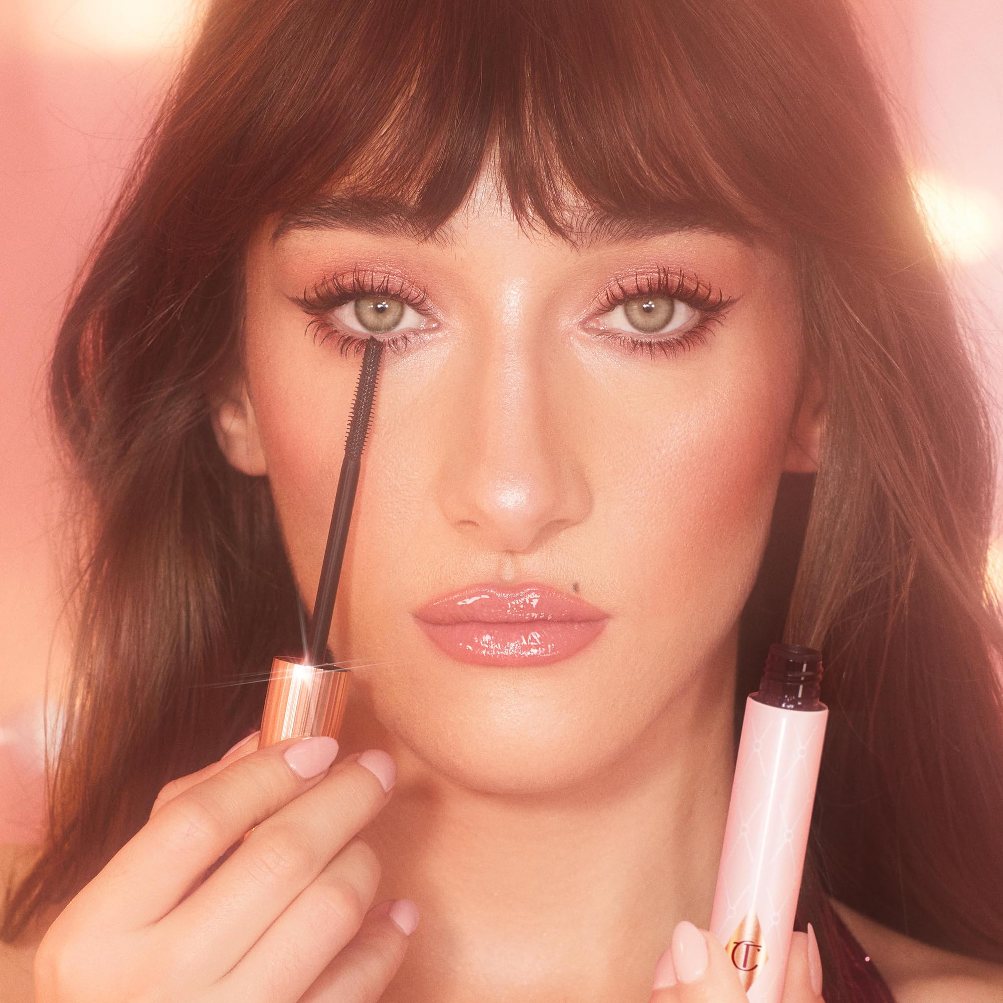 Charlotte Tilbury Pillow Talk Push Up Lashes Mascara applicator applying lift and length.