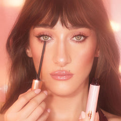 Charlotte Tilbury Pillow Talk Push Up Lashes Mascara applicator applying lift and length.